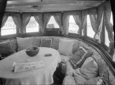 Cruising in comfort, the saloon of motor yacht Scaramouche 1927. Creator: Kirk & Sons of Cowes