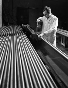 Crack detection on round bars, J Beardshaw & Sons, Sheffield, South Yorkshire, 1963. Creator: Michael Walters