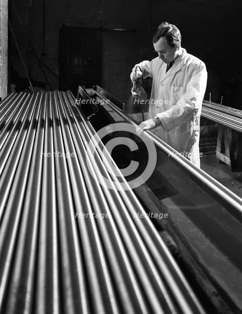 Crack detection on round bars, J Beardshaw & Sons, Sheffield, South Yorkshire, 1963.   Creator: Michael Walters.