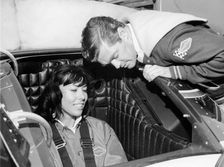 Craig Breedlove explaining the controls of Spirit of America Sonic I to his wife, Lee, c1965
