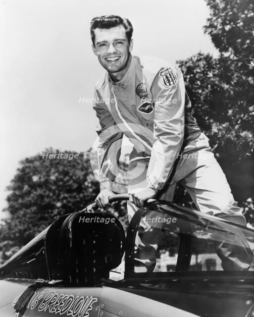 Craig Breedlove posing on top of the Spirit of America. Artist: Unknown