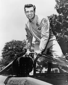 Craig Breedlove posing on top of the Spirit of America
