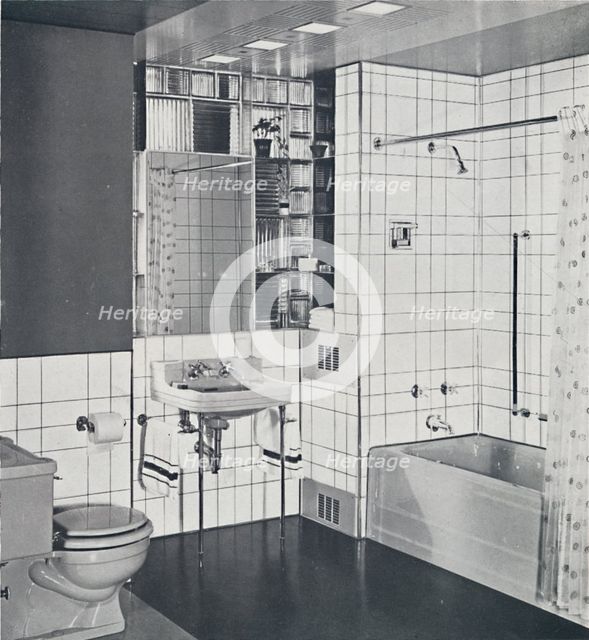 'Crane Co. - A compact recess tiled in canary yellow, scored with orange, showing the stainless-stee Artist: Unknown.