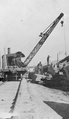 Crane being used in construction of new railway bridge, between c1900 and c1930. Creator: Unknown