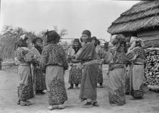 Crane dance of the Ainu women, 1908. Creator: Arnold Genthe