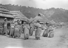 Crane dance of the Ainu women, 1908. Creator: Arnold Genthe