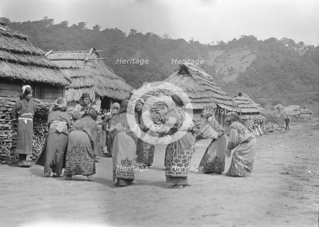 Crane dance of the Ainu women, 1908. Creator: Arnold Genthe.