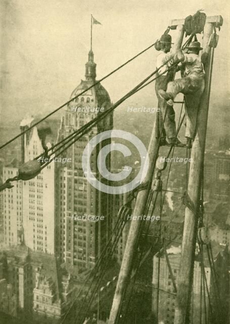 'Crane Men at Work on a New York Skyscraper', c1930. Creator: GPA.