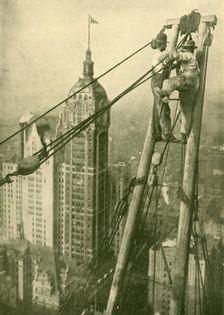 Crane Men at Work on a New York Skyscraper c1930. Creator: GPA