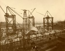 Cranes at Work on the London County Hall c1930. Creator: Holland & Hannen