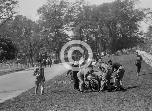 Crashed Austin 7 of B Sparrow, Donington Park Race Meeting, Leicestershire, 1933. Artist: Bill Brunell.