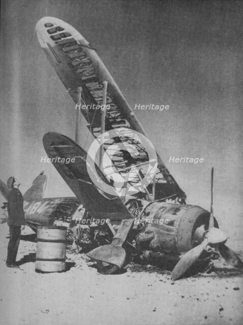 'Crashed in the Regia Aeronautica's Graveyard', 1941.  Artist: Unknown.