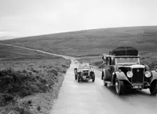 Cream Cracker Team MG PB of CAN May passing a Daimler at the MCC Torquay Rally, July 1937. Artist: Bill Brunell