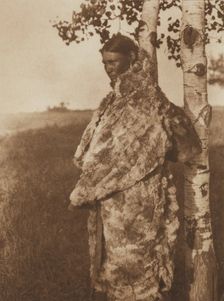 Cree Woman with Fur Robe, 1926. Creator: Edward Sheriff Curtis