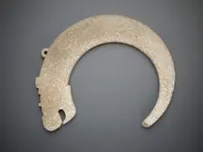 Crescent-shaped pendant in the form of a dragon, Eastern Zhou dynasty, 5th-4th century BCE. Creator: Unknown