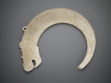 Crescent-shaped pendant in the form of a dragon, Eastern Zhou dynasty, 5th-4th century BCE. Creator: Unknown