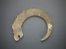 Crescent-shaped pendant in the form of a dragon, Eastern Zhou dynasty, 5th-4th century BCE. Creator: Unknown