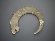 Crescent-shaped pendant in the form of a dragon, Eastern Zhou dynasty, 5th-4th century BCE. Creator: Unknown
