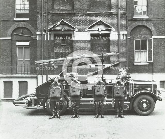 Crew in breathing apparatus, London Fire Brigade Headquarters, London, 1934. Artist: Unknown.