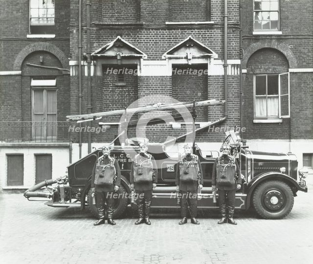 Crew in breathing apparatus, London Fire Brigade Headquarters, London, 1934. Artist: Unknown.