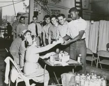 Crew members of the USS Lake Champlain (CVA-39) participating in the ship's two day..., 1950s. Creator: United States Navy