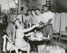 Crew members of the USS Lake Champlain (CVA-39) participating in the ship's two day..., 1950s. Creator: United States Navy