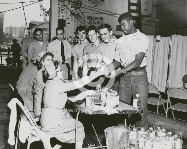 Crew members of the USS Lake Champlain (CVA-39) participating in the ship's two day..., 1950s.  Creator: United States Navy.