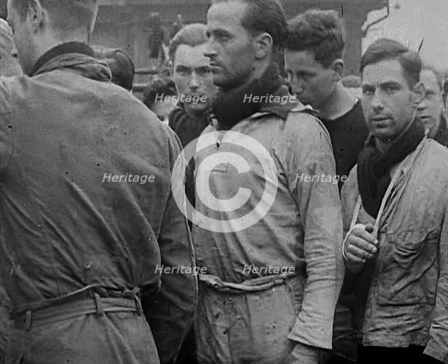 Crew of the Destroyed Bismarck Entering Captivity, 1943. Creator: British Pathe Ltd.