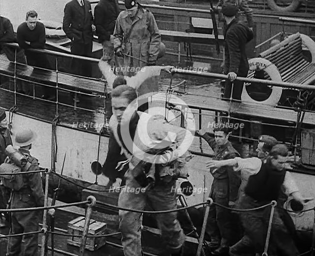 Crew of the Destroyed Bismarck Walking up a Gangplank Into a British Ship, 1943. Creator: British Pathe Ltd.