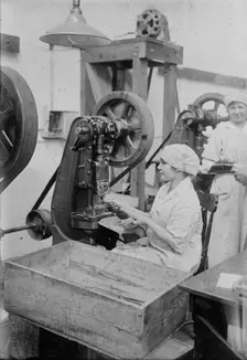 Crimping ignition tubes, between c1915 and c1920. Creator: Bain News Service