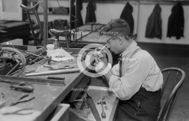Crippled jewelry worker, between c1915 and c1920. Creator: Bain News Service.