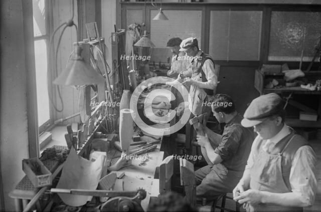 Cripples making artificial limbs, between c1915 and c1920. Creator: Bain News Service.