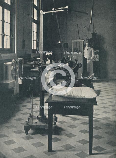 'Crookes, Rontgen and Finsen - Using the Marvellous X-Rays Apparatus', c1925. Artist: Unknown.