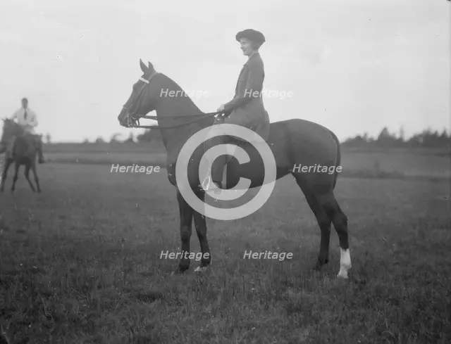 Crosbie, Violet, Miss, on horseback at Long Beach, New York, 1917 Aug. Creator: Arnold Genthe.