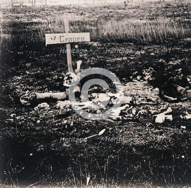Cross and human remains, c1914-c1918. Artist: Unknown.