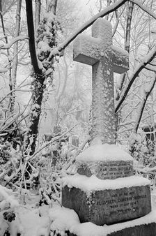 Cross on a grave in Highgate Cemetery, Hampstead, London, c1980-c1984. Artist: John Gay