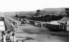 Crossing the first permanent Victoria Bridge, Brisbane, c1874. Creator: Unknown
