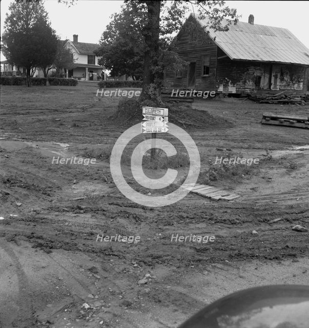 Crossroads hamlet after a rain, Culbreth, Granville County, North Carolina, 1939. Creator: Dorothea Lange.