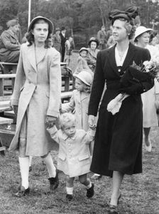 Crown Prince Carl Gustav with mother Sibylla and big sister Margaretha, Stockholm, 1947. Creator: Unknown
