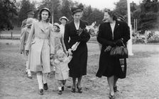 Crown Prince Carl Gustav with mother Sibylla and big sister Margaretha, Stockholm, 1947. Creator: Unknown