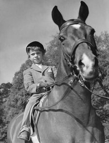 Crown Prince Carl Gustaf of Sweden and his horse, Nivea, Haga Castle, Sweden 1952