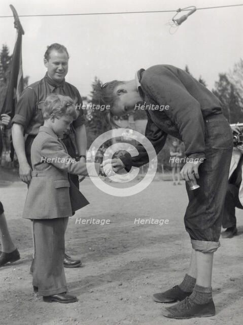 Crown Prince Carl Gustaf of Sweden at a prize-giving ceremony, Stockholm, Sweden, 1953. Artist: Unknown