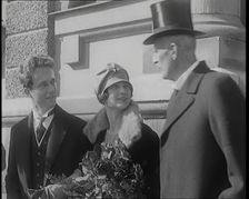 Crown Prince Leopold of Belgium and Princess Astrid of Sweden Walking With Her Parents..., 1926. Creator: British Pathe Ltd
