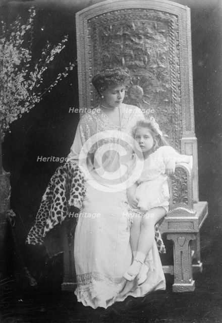 Crown Princess of Roumania seated with her daughter, 1910. Creator: Bain News Service.