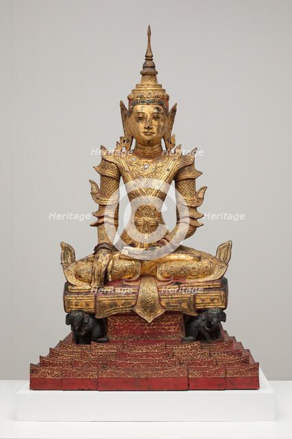 Crowned and Bejewelled Buddha Seated on an Elephant Throne, Late 19th century. Creator: Unknown.