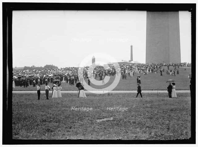 Crowd at base of Washington Monument, Washington, D.C., between 1909 and 1923. Creator: Harris & Ewing.