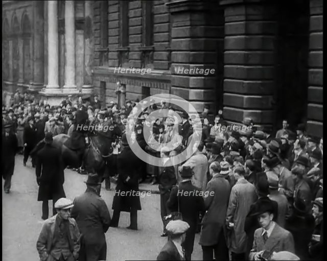 Crowd gathering in London, 1936. Creator: British Pathe Ltd.