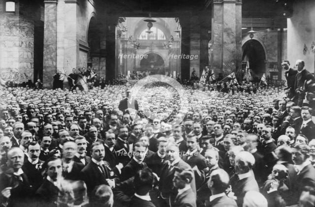 Crowd on stock exchange floor, London, between 1910-1920. Creator: Bain News Service.
