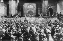 Crowd on stock exchange floor, London, between 1910-1920. Creator: Bain News Service