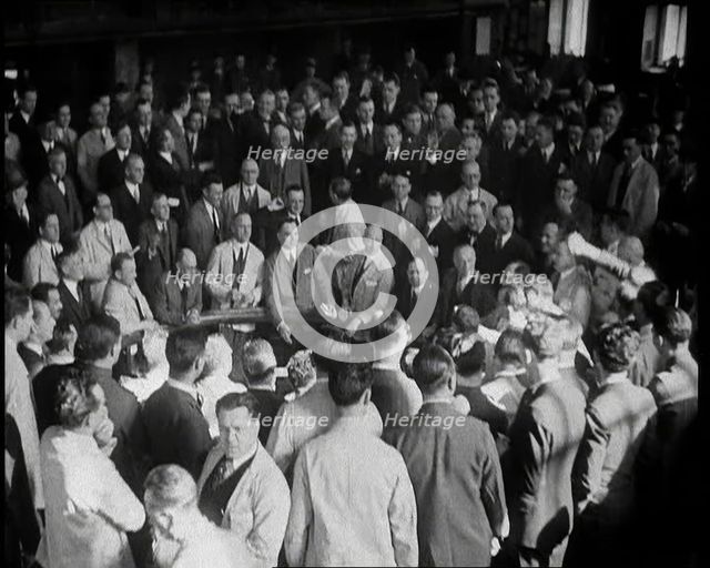 Crowd of Civilians Buying and Selling Stocks and Shares, 1932. Creator: British Pathe Ltd.